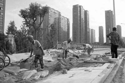 《塘河边的道路建设者》2